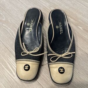 CHANEL Black and Cream Mules with Bow Detail